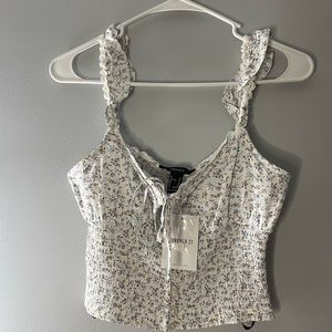 Floral design, tie on front, forever 21, never worn :) size S